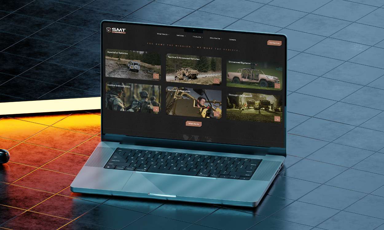 SMT Defence Website Mockup on a Laptop