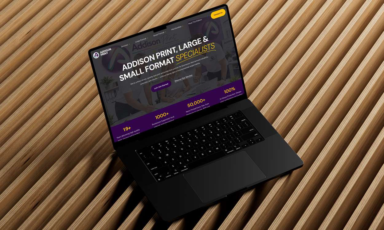 Addison Print website mockup on a laptop